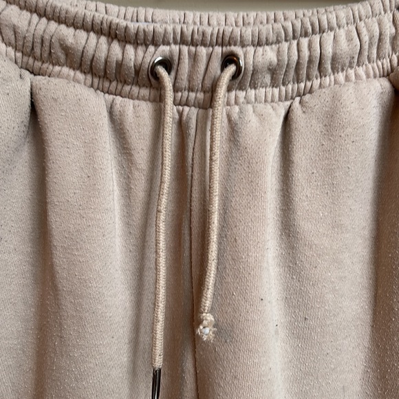 High rise beige sweatpants with elastic hemp on ankles and waist. - Picture 6 of 6